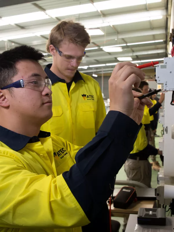 Class of trainees with instructor during electrotechnology class.